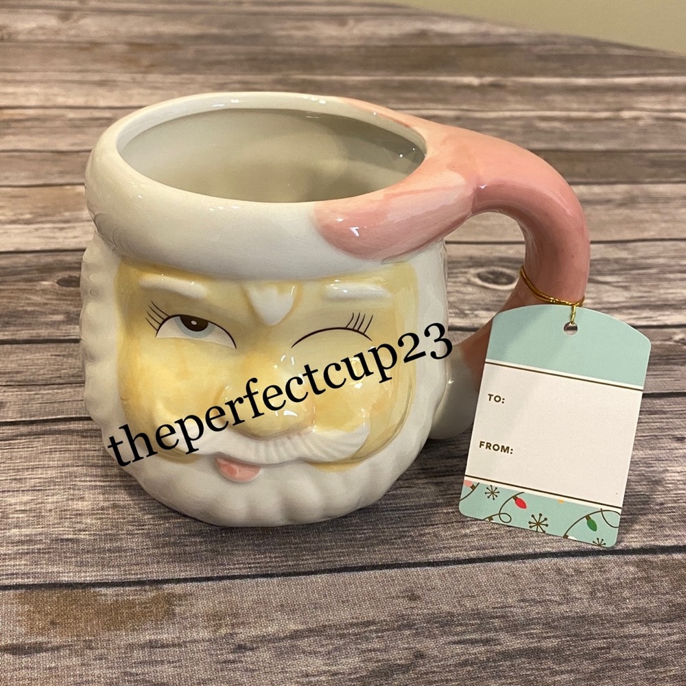 Pink Winking Face Santa Mug